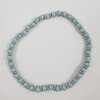 Licht blauwe en zilver kralen rek armband