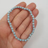Licht blauwe en zilver kralen rek armband