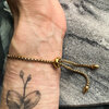 Goudkleurige armbanden met facet geslepen edelstenen