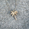 Oceaan ketting palmboom goud