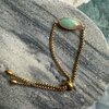 Goudkleurige armbanden met facet geslepen edelstenen