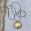 Ketting ronde hanger met gouden takjes