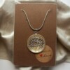 Ketting ronde hanger met gouden takjes