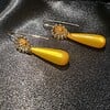 Statement oorbellen met polaris druppel - geel