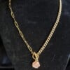 Vergulde ketting met bloem bedel - roze