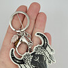 Boho koe schedel glow in the dark sleutelhanger