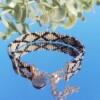 Geweven kralen armband 'Xoxo black & grey'
