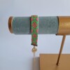 Geweven kralen armband 'Xoxo green & hot pink'