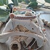 Handgeknoopte macramé armband met Aztek symbool