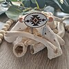 Handgeknoopte macramé armband met Aztek symbool