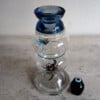 SPIN in de AANVAL glasobject met kandelaar functie