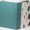 Notitie en/of schetsboek met linnen en omslag decoratief papier