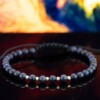 Blauwe goudsteen armband met 14 karaat geelgouden kralen