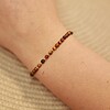 Tijgeroog armband met 14 karaat geelgouden kralen van 2,5 mm