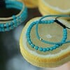 Turkoois armband met 14 karaat geelgouden kralen