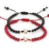 Zwart onyx armband met 14 karaat geelgouden Hartje met vlinder