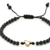Zwart onyx armband met 14 karaat geelgouden Hartje met vlinder