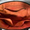 Bruine tas met fantasie tak