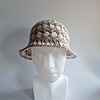 Gehaakte bucket hat 'Neutral nudes'