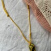 Simpele macrame edelsteen kettingen