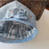 denim baret met bloem