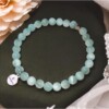 Elastische armband groene angeliet synthetisch