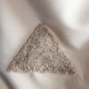 Fluwelen tas met driehoek in wol met gouddetail
