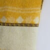 Gele wollen gilet met bruin gebloemd vintage bandje