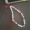Glow Charm Telefoonhanger