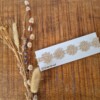 Haarbandje goud doorlopend met hartjes of bloemen