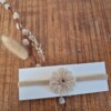 Haarbandje met wollen bloem