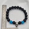 Handgemaakte herenarmband Black Onyx doodskop