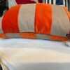 Ollie oranje kussenhoes met camel kleurige streep