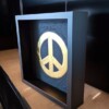 Peace logo 23ct goud verguld kunstwerk in lijst