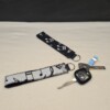 Sleutelhanger met muzieknoten print
