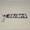 Sleutelhanger met muzieknoten print – Met praktische musketonhaak