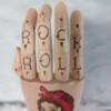 Tattoo hand rock and roll