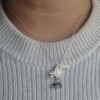 Unieke zilveren hanger toekan Noukie met turquoise kraaltjes