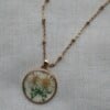 Ketting 45cm goud met wit/groene droogbloem