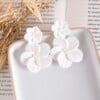 Alexia- Statement oorbellen met 2 bloemen