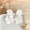 Alexia- Statement oorbellen met 2 bloemen