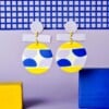 Blue, violet and yellow patterned color block earrings. Handmade polymer clay statement dangles. 80s memphis group, bold dopamine jewelry.