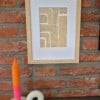 Handgeschept papier abstracte vormen in een houtkleurige A4 lijst