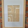 Handgeschept papier abstracte vormen in een houtkleurige A4 lijst