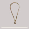 Ketting met glasparels en schakels