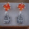 Swarovski Oorstekers en Grachtenpandjes Bedel oorbellen, vier Nederland in stijl!