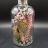 1 Kaarsenhouder met fleurige droogbloemen incl. kaars