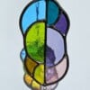 A-symmetrische zonnevanger bright regenboog met kristal