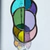 A-symmetrische zonnevanger regenboog met kristal