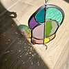 A-symmetrische zonnevanger regenboog met kristal